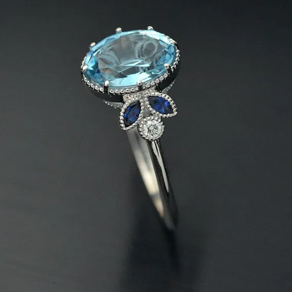 Jenn Oval Aquamarine or Morganite engagement ring with marquises